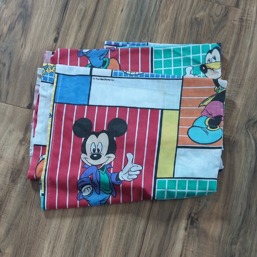 Vintage Disney Mickey mouse themed twin size sheet.